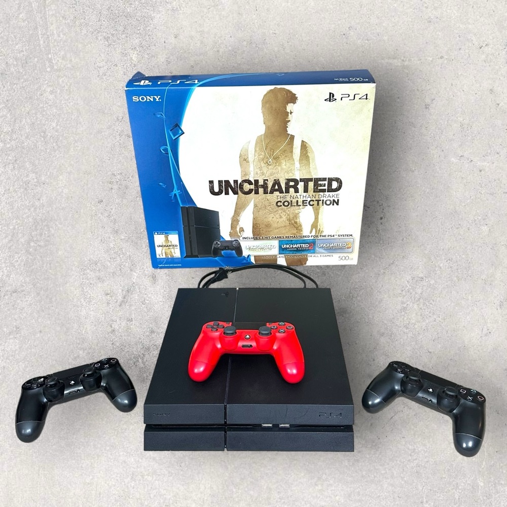 Sony PlayStation 4 with Box! Includes THREE Dual Shock Controllers Black & Red